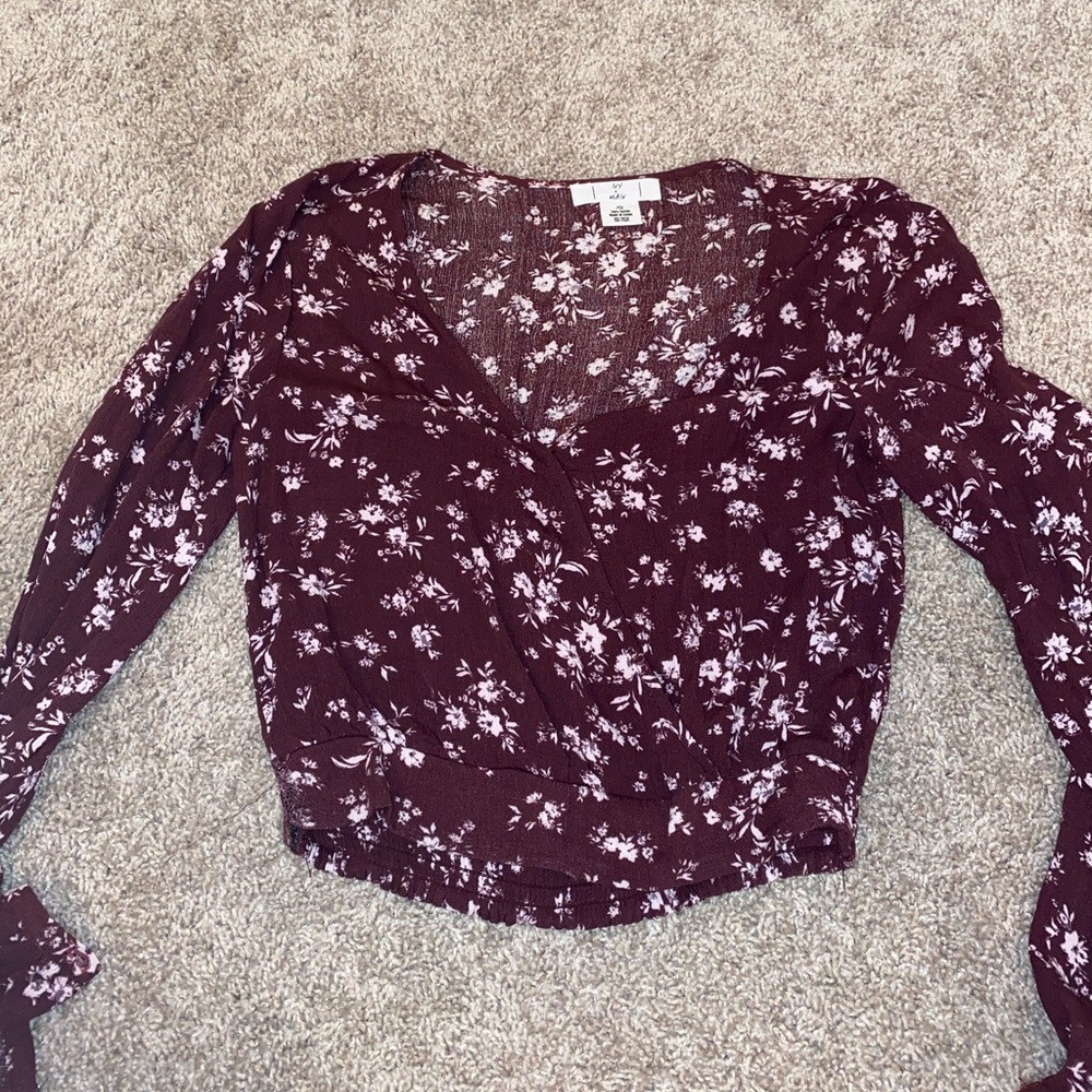 Cropped red floral top.